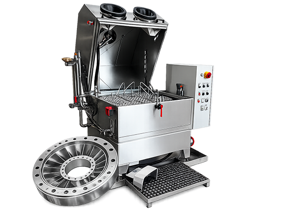 Machine de dégraissage avec pièce aéronautique